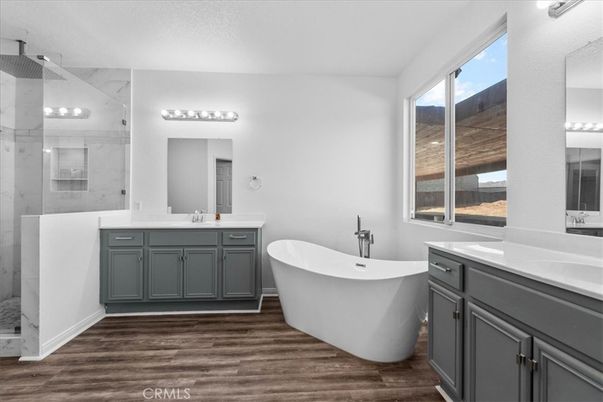 Bathroom, Dual Sink Vanities, Free Standing Baths, Glass Shower, Interior, Marble Walls, Wood Texture Flooring