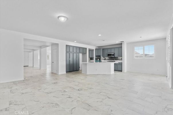 Empty room, Interior, Kitchen, Marble, Recessed Lighting, Stainless Steel Appliances