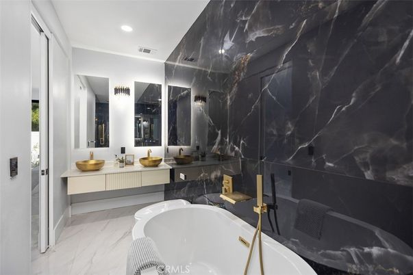 Bathroom, Dual Sink Vanities, Interior, Marble, Marble Walls, Recessed Lighting