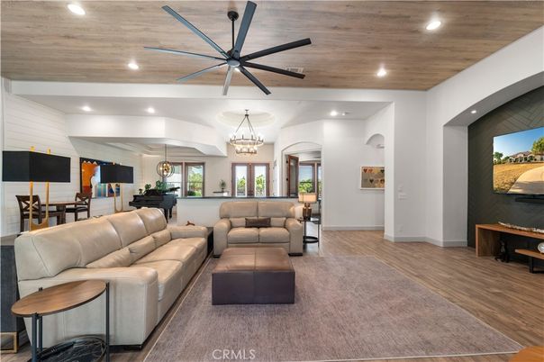 Chandelier, Dining room, Interior, Living room, Piano, Recessed Lighting, Wooden Ceilings, Wood Texture Flooring