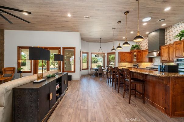 Dining room, Interior, Kitchen, Pendant Lights, Recessed Lighting, Stainless Steel Appliances, Wooden Ceilings, Wood Texture Flooring