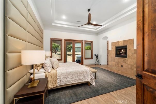 Bedroom, Fireplace, Interior, Recessed Lighting, Wood Texture Flooring
