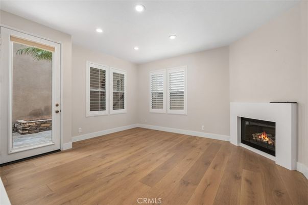Empty room, Fireplace, Interior, Recessed Lighting, Wood Texture Flooring