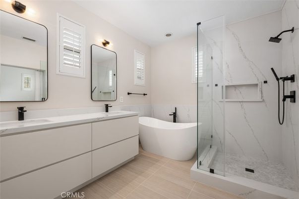 Bathroom, Dual Sink Vanities, Free Standing Baths, Glass Shower, Interior, Marble Walls