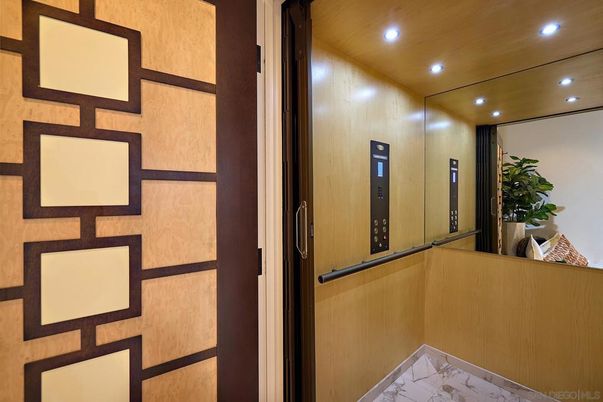 Elevator, Interior, Marble, Recessed Lighting, Wooden Ceilings, Wooden Walls