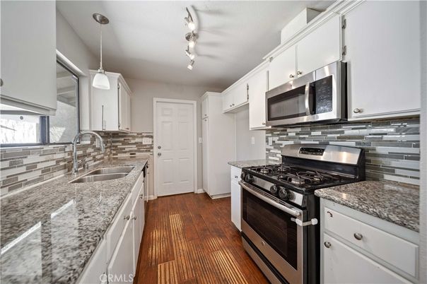 Interior, Kitchen, Pendant Lights, Stainless Steel Appliances, Wood Texture Flooring