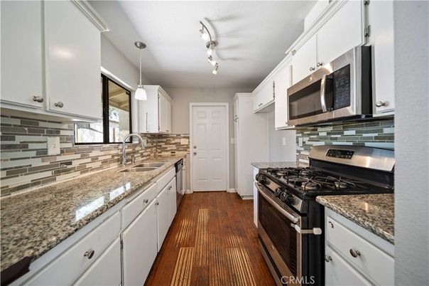 Interior, Kitchen, Pendant Lights, Stainless Steel Appliances, Wood Texture Flooring