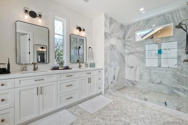 Bathroom, Dual Sink Vanities, Glass Shower, Interior, Marble, Marble Walls, Recessed Lighting