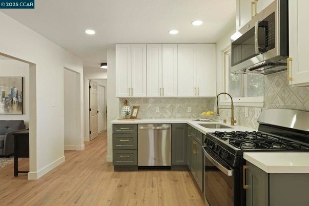 Interior, Kitchen, Recessed Lighting, Stainless Steel Appliances, Wood Texture Flooring