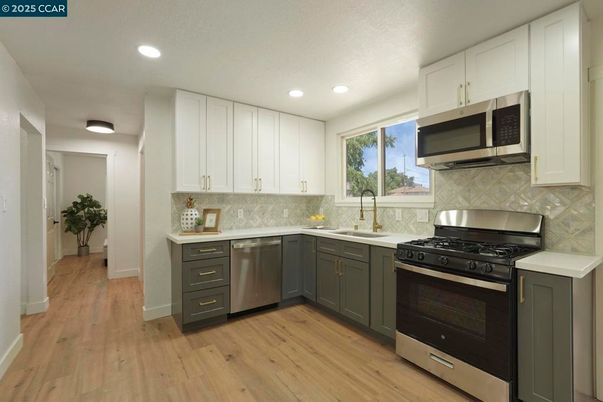 Interior, Kitchen, Recessed Lighting, Stainless Steel Appliances, Wood Texture Flooring