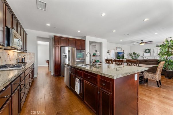 Dining room, Interior, Kitchen, Recessed Lighting, Stainless Steel Appliances, Wood Texture Flooring