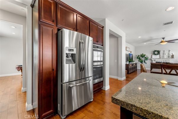 Dining room, Interior, Kitchen, Recessed Lighting, Stainless Steel Appliances, Wood Texture Flooring