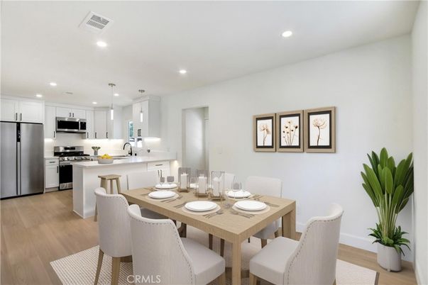 Dining room, Interior, Kitchen, Pendant Lights, Recessed Lighting, Stainless Steel Appliances, Wood Texture Flooring