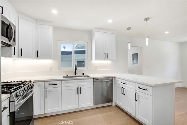 Interior, Kitchen, Pendant Lights, Recessed Lighting, Stainless Steel Appliances, Wood Texture Flooring