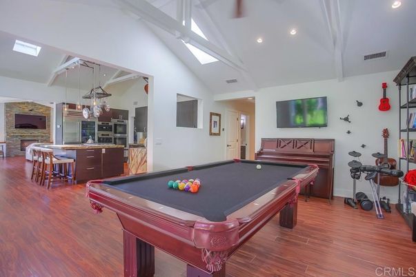 Billiard Table, Fireplace, Game Room, Interior, Kitchen, Pendant Lights, Recessed Lighting, Stone Walls, Wood Texture Flooring
