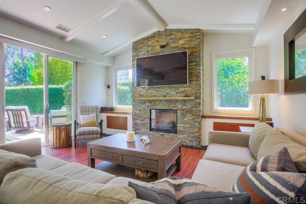 Fireplace, Interior, Living room, Recessed Lighting, Stone Walls, Wood Texture Flooring