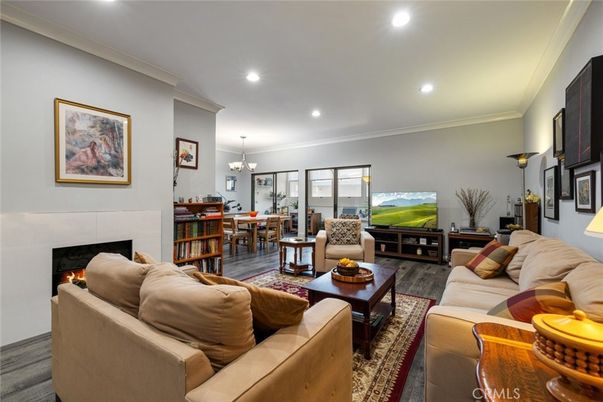 Chandelier, Dining room, Fireplace, Interior, Living room, Recessed Lighting, Wood Texture Flooring