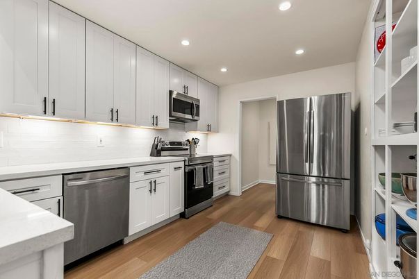 Interior, Kitchen, Recessed Lighting, Stainless Steel Appliances, Wood Texture Flooring
