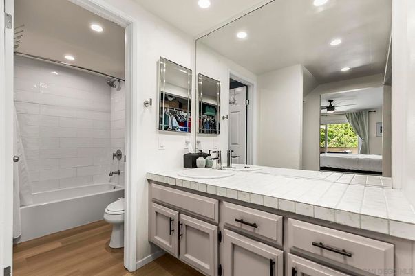 Bathroom, Interior, Recessed Lighting, Tile Countertops, Wood Texture Flooring