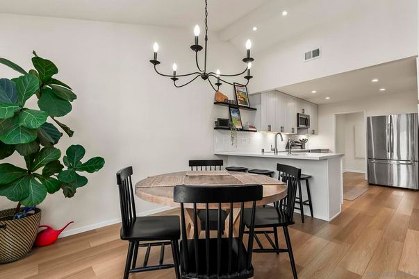 Chandelier, Dining room, Interior, Kitchen, Recessed Lighting, Stainless Steel Appliances, Wood Texture Flooring