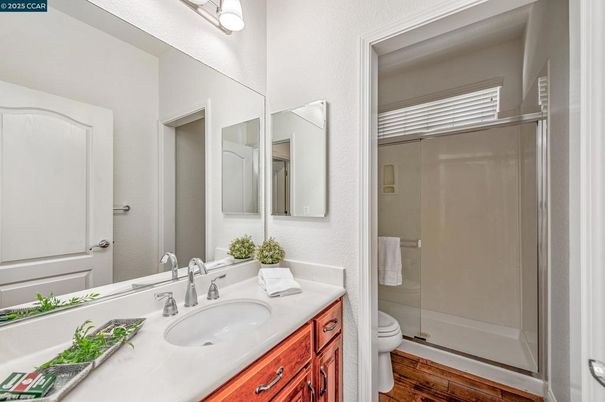 Bathroom, Dual Sink Vanities, Glass Shower, Interior, Recessed Lighting, Tile Countertops