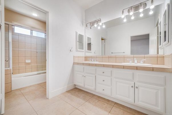 Bathroom, Dual Sink Vanities, Interior, Recessed Lighting, Tile Countertops