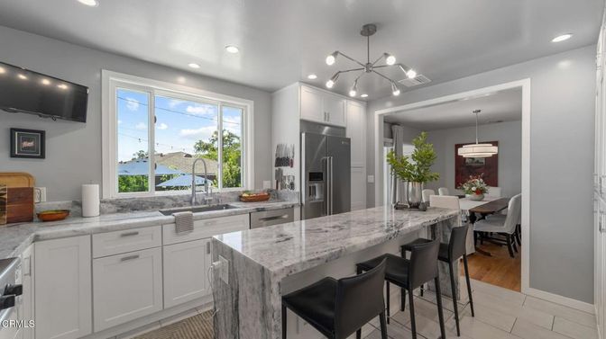 Dining room, Interior, Kitchen, Pendant Lights, Recessed Lighting, Stainless Steel Appliances, Water, Wood Texture Flooring