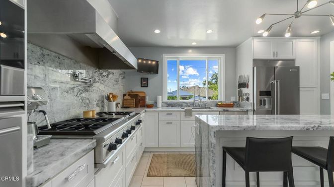 Interior, Kitchen, Marble Walls, Recessed Lighting, Stainless Steel Appliances