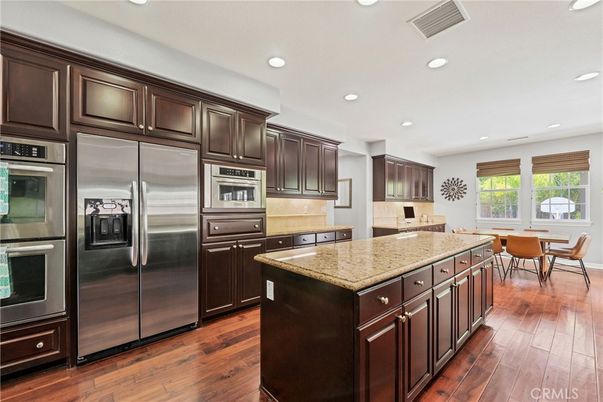 Dining room, Interior, Kitchen, Recessed Lighting, Stainless Steel Appliances, Wood Texture Flooring