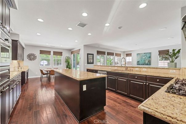 Dining room, Interior, Kitchen, Recessed Lighting, Stainless Steel Appliances, Wood Texture Flooring
