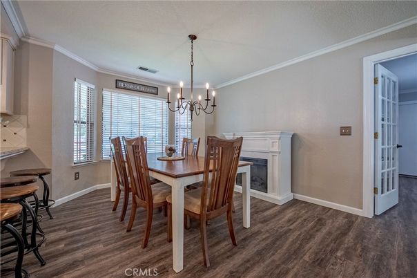 Chandelier, Dining room, Fireplace, Interior, Wood Texture Flooring