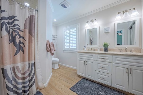 Bathroom, Dual Sink Vanities, Interior, Recessed Lighting, Wood Texture Flooring