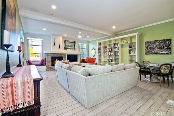 Dining room, Fireplace, Interior, Living room, Recessed Lighting, Wood Texture Flooring