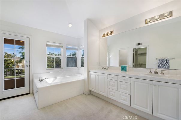 Bathroom, Dual Sink Vanities, Interior, Recessed Lighting, Tile Countertops