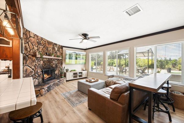 Dining room, Fireplace, Interior, Living room, Stone Walls, Wood Texture Flooring