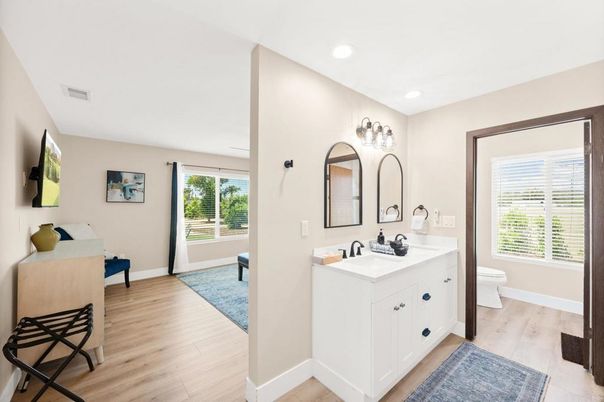 Bathroom, Dual Sink Vanities, Interior, Recessed Lighting, Wood Texture Flooring
