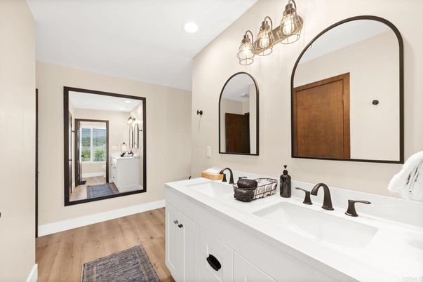 Bathroom, Dual Sink Vanities, Interior, Recessed Lighting, Wood Texture Flooring