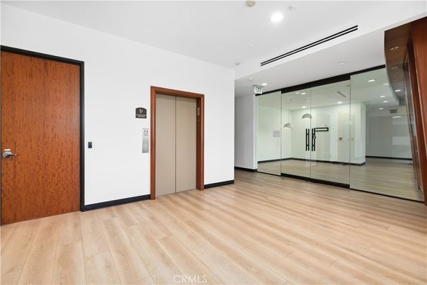 Elevator, Interior, Recessed Lighting, Wood Texture Flooring