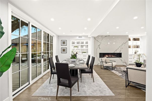 Dining room, Fireplace, Interior, Marble Walls, Recessed Lighting, Wood Texture Flooring