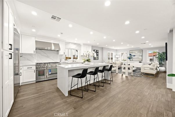 Interior, Kitchen, Living room, Marble Walls, Recessed Lighting, Stainless Steel Appliances, Wood Texture Flooring
