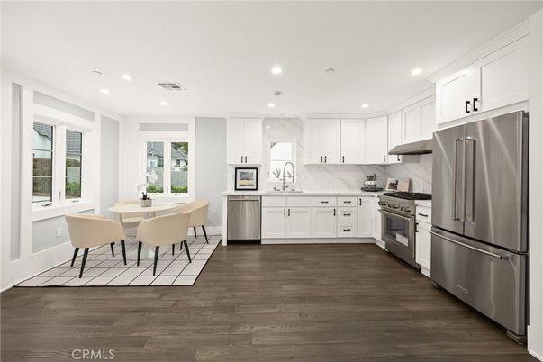 Dining room, Interior, Kitchen, Recessed Lighting, Stainless Steel Appliances, Wood Texture Flooring