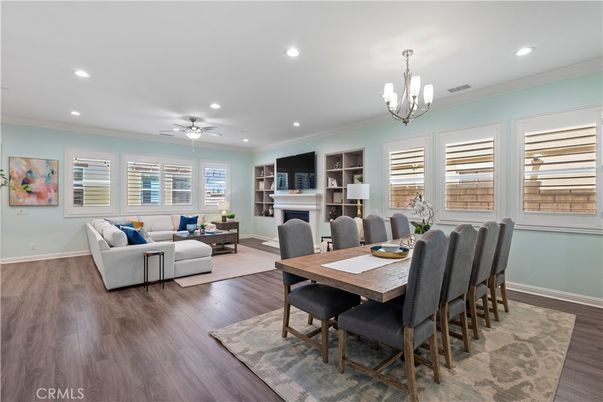 Chandelier, Dining room, Fireplace, Interior, Living room, Recessed Lighting, Wood Texture Flooring