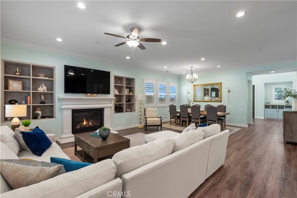 Chandelier, Dining room, Fireplace, Interior, Living room, Recessed Lighting, Wood Texture Flooring