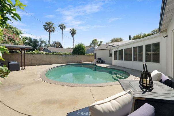 Exterior, Pool, Solar Panels