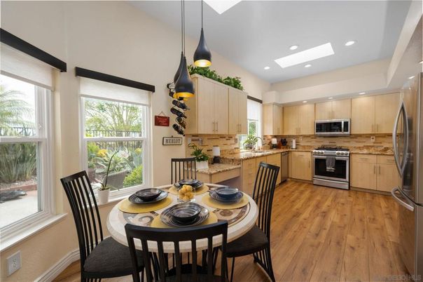 Dining room, Interior, Kitchen, Pendant Lights, Recessed Lighting, Stainless Steel Appliances, Wood Texture Flooring