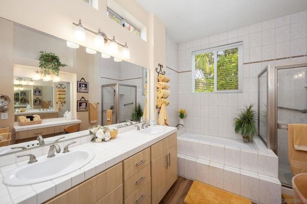 Bathroom, Dual Sink Vanities, Glass Shower, Interior, Tile Countertops, Wood Texture Flooring