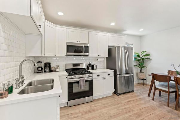 Interior, Kitchen, Recessed Lighting, Stainless Steel Appliances, Wood Texture Flooring