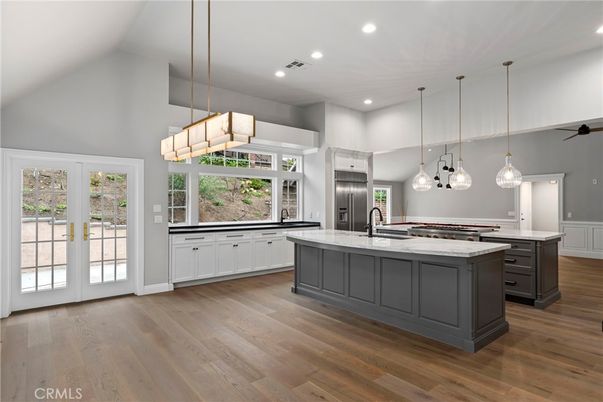 Chandelier, Interior, Kitchen, Pendant Lights, Recessed Lighting, Stainless Steel Appliances, Wood Texture Flooring