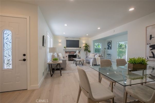 Dining room, Fireplace, Interior, Living room, Recessed Lighting, Wood Texture Flooring
