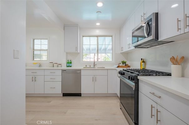 Interior, Kitchen, Recessed Lighting, Stainless Steel Appliances, Wood Texture Flooring